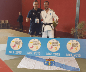 Jorge Diaz del Rio y Alberto Castro (tecnico), posando con la medalla